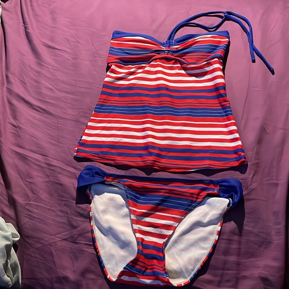 Two piece tankini top is small and bottom is medium